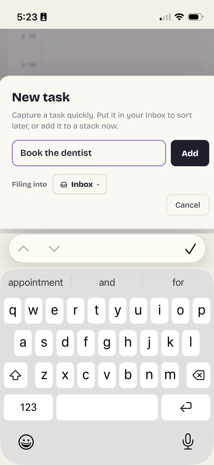 The New task sheet in Mellowtask with Book the dentist typed, filing into the Inbox, keyboard up.